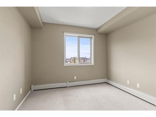 316-15 Saddlestone Way Ne, Calgary, AB - Indoor Photo Showing Other Room