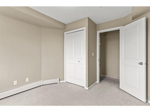 316-15 Saddlestone Way Ne, Calgary, AB - Indoor Photo Showing Other Room