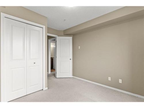 316-15 Saddlestone Way Ne, Calgary, AB - Indoor Photo Showing Other Room