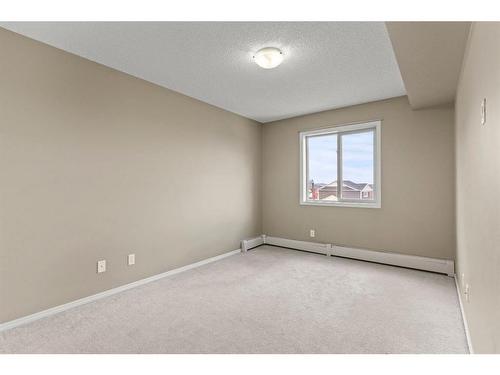 316-15 Saddlestone Way Ne, Calgary, AB - Indoor Photo Showing Other Room