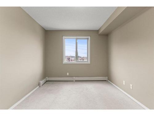 316-15 Saddlestone Way Ne, Calgary, AB - Indoor Photo Showing Other Room