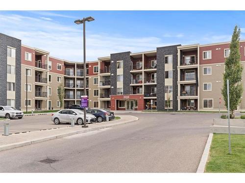 316-15 Saddlestone Way Ne, Calgary, AB - Outdoor With Balcony With Facade