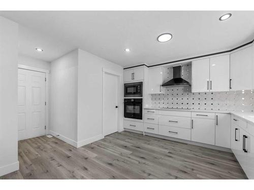 2046 Luxstone Boulevard, Airdrie, AB - Indoor Photo Showing Kitchen