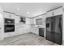 2046 Luxstone Boulevard, Airdrie, AB  - Indoor Photo Showing Kitchen With Upgraded Kitchen 