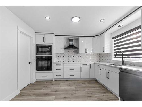 2046 Luxstone Boulevard, Airdrie, AB - Indoor Photo Showing Kitchen