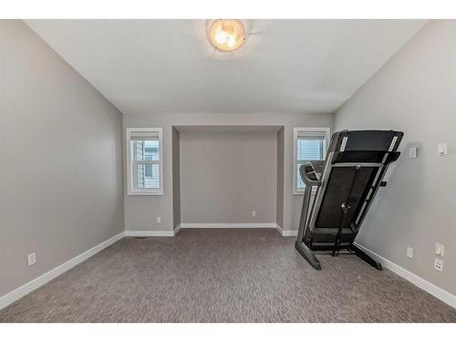 1204 Brightoncrest Green Se, Calgary, AB - Indoor Photo Showing Gym Room