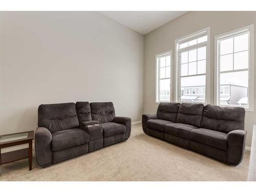 24 Osborne Link Sw, Airdrie, AB - Indoor Photo Showing Living Room