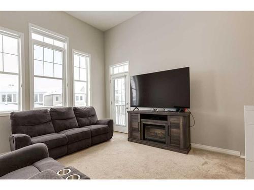 24 Osborne Link Sw, Airdrie, AB - Indoor Photo Showing Living Room