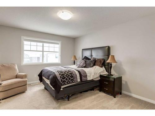 24 Osborne Link Sw, Airdrie, AB - Indoor Photo Showing Bedroom