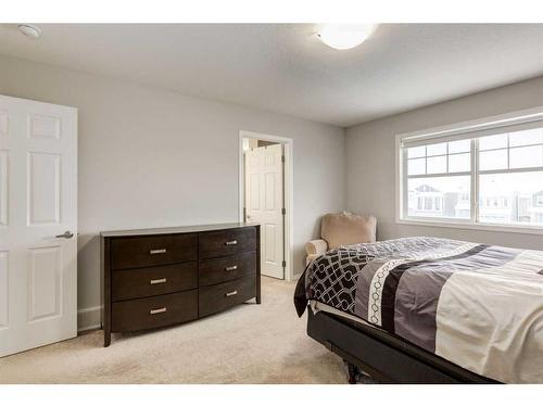 24 Osborne Link Sw, Airdrie, AB - Indoor Photo Showing Bedroom