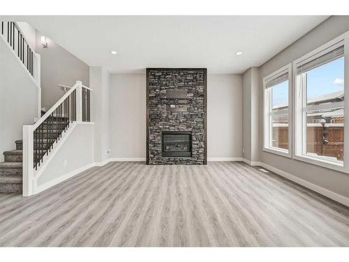 326 Legacy View Se, Calgary, AB - Indoor Photo Showing Living Room With Fireplace