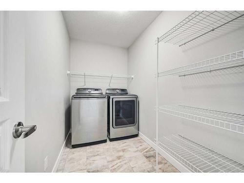 326 Legacy View Se, Calgary, AB - Indoor Photo Showing Laundry Room