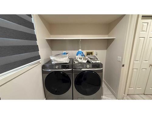 28 Macewan Ridge View Nw, Calgary, AB - Indoor Photo Showing Laundry Room