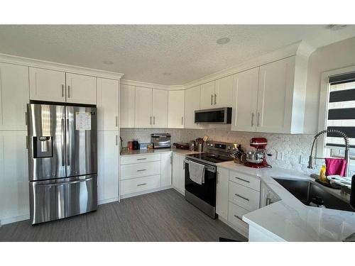 28 Macewan Ridge View Nw, Calgary, AB - Indoor Photo Showing Kitchen With Stainless Steel Kitchen