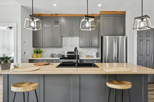 6-610 4 Avenue Sw, Sundre, AB - Indoor Photo Showing Kitchen With Upgraded Kitchen