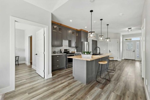 6-610 4 Avenue Sw, Sundre, AB - Indoor Photo Showing Kitchen With Upgraded Kitchen