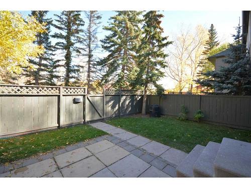 51-4936 Dalton Drive Nw, Calgary, AB - Outdoor With Backyard