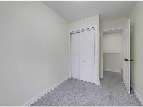 51-4936 Dalton Drive Nw, Calgary, AB - Indoor Photo Showing Other Room