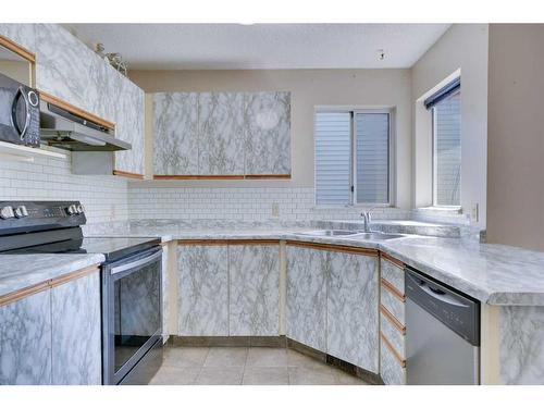 9029 21 Street Se, Calgary, AB - Indoor Photo Showing Kitchen