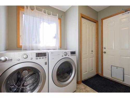 649 Hamptons Drive Nw, Calgary, AB - Indoor Photo Showing Laundry Room