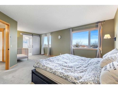 649 Hamptons Drive Nw, Calgary, AB - Indoor Photo Showing Bedroom