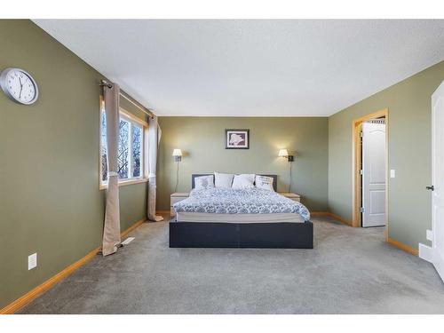 649 Hamptons Drive Nw, Calgary, AB - Indoor Photo Showing Bedroom