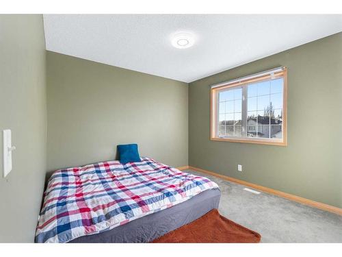 649 Hamptons Drive Nw, Calgary, AB - Indoor Photo Showing Bedroom