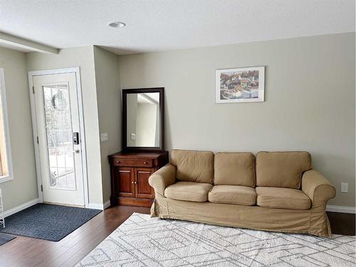 649 Hamptons Drive Nw, Calgary, AB - Indoor Photo Showing Living Room