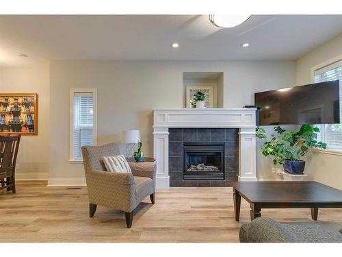 710 23 Avenue Nw, Calgary, AB - Indoor Photo Showing Living Room With Fireplace