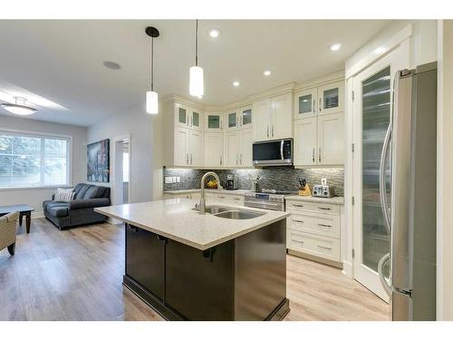 710 23 Avenue Nw, Calgary, AB - Indoor Photo Showing Kitchen With Double Sink With Upgraded Kitchen