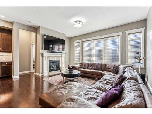 318 Mahogany Manor Se, Calgary, AB - Indoor Photo Showing Living Room With Fireplace