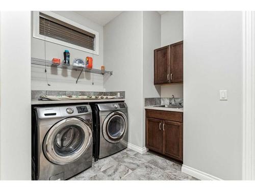 318 Mahogany Manor Se, Calgary, AB - Indoor Photo Showing Laundry Room