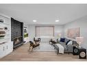 287 Templeside Circle Ne, Calgary, AB  - Indoor Photo Showing Living Room With Fireplace 