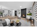 287 Templeside Circle Ne, Calgary, AB  - Indoor Photo Showing Living Room With Fireplace 