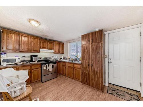 43 Castleridge Way Ne, Calgary, AB - Indoor Photo Showing Kitchen With Double Sink