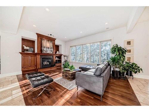 67 Discovery Valley Cove Sw, Calgary, AB - Indoor Photo Showing Living Room With Fireplace