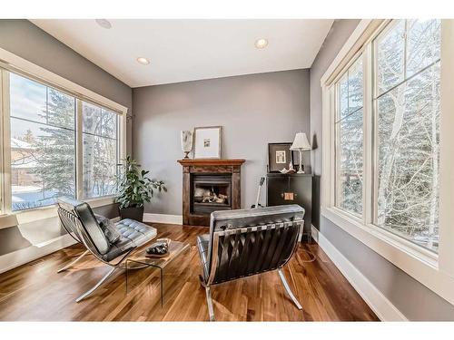 67 Discovery Valley Cove Sw, Calgary, AB - Indoor Photo Showing Living Room With Fireplace