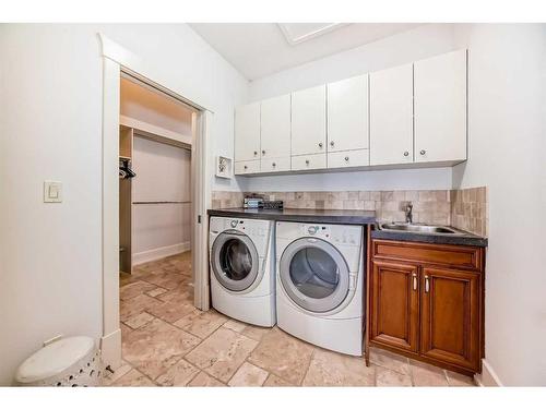 67 Discovery Valley Cove Sw, Calgary, AB - Indoor Photo Showing Laundry Room