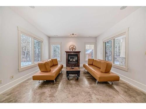 67 Discovery Valley Cove Sw, Calgary, AB - Indoor Photo Showing Living Room With Fireplace