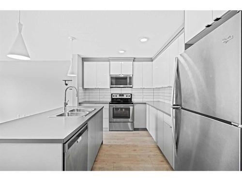 709 Skyview Ranch Grove Ne, Calgary, AB - Indoor Photo Showing Kitchen With Stainless Steel Kitchen With Double Sink With Upgraded Kitchen