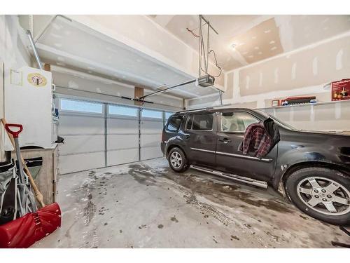 173 Savanna Passage Ne, Calgary, AB - Indoor Photo Showing Garage