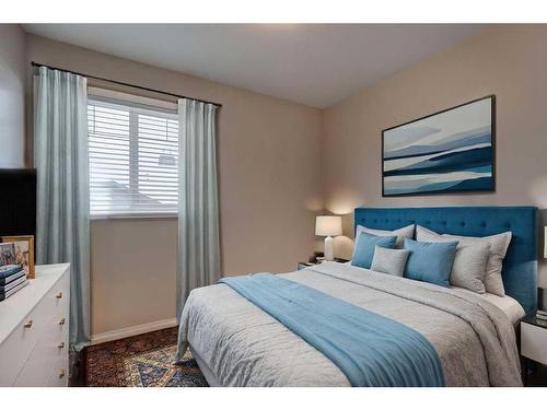 27 Spring Meadows Bay, Okotoks, AB - Indoor Photo Showing Bedroom