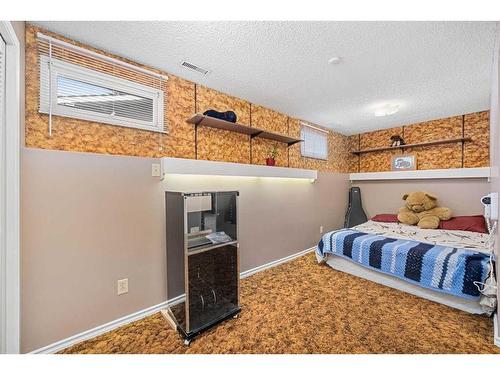 560 Willacy Drive Se, Calgary, AB - Indoor Photo Showing Bedroom