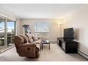 3422-60 Panatella Street Nw, Calgary, AB  - Indoor Photo Showing Living Room 