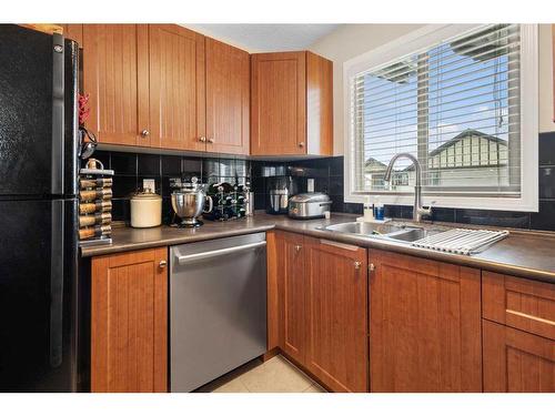 3422-60 Panatella Street Nw, Calgary, AB - Indoor Photo Showing Kitchen With Double Sink