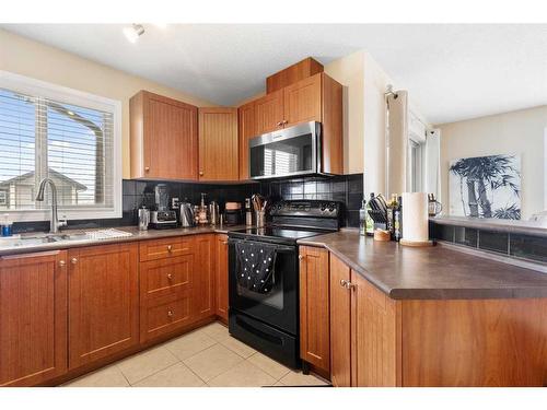 3422-60 Panatella Street Nw, Calgary, AB - Indoor Photo Showing Kitchen With Double Sink