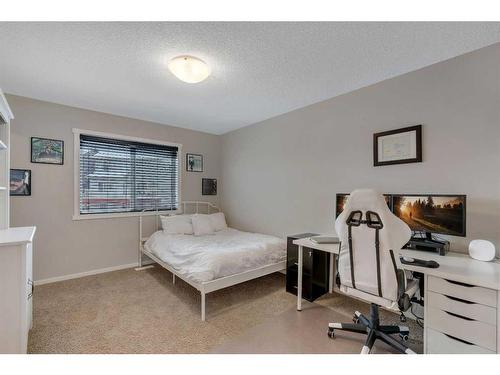 124 Panamount Way Nw, Calgary, AB - Indoor Photo Showing Bedroom