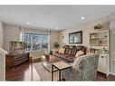 124 Panamount Way Nw, Calgary, AB  - Indoor Photo Showing Living Room 