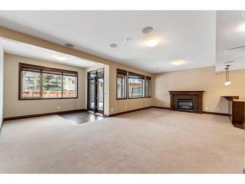 212 Cranarch Circle Se, Calgary, AB - Indoor With Fireplace