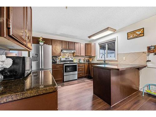 81 Castleglen Road Ne, Calgary, AB - Indoor Photo Showing Kitchen With Stainless Steel Kitchen